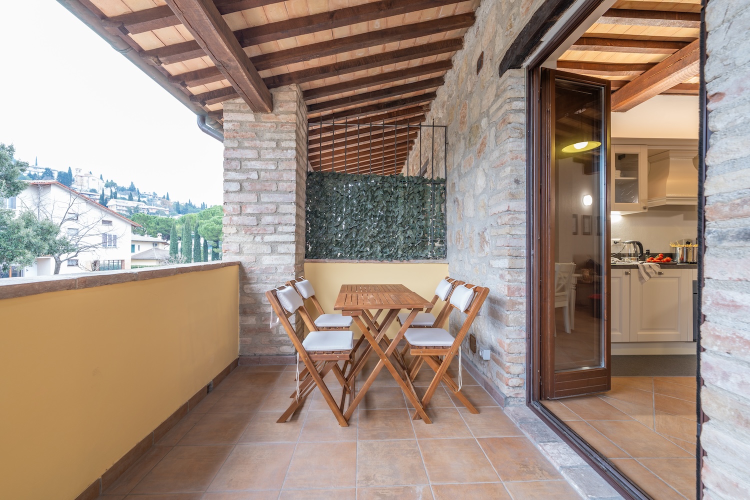 The balcony with table and chairs